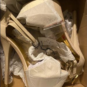 Tan snake skin platforms